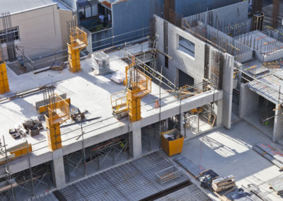 A full view of an underconstruction commercial building using concrete , Los Angeles CA